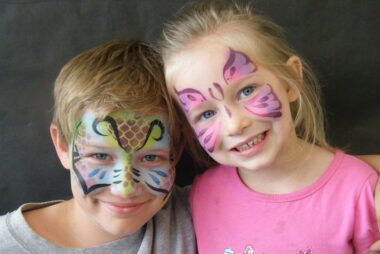 face painting on a boy and girl