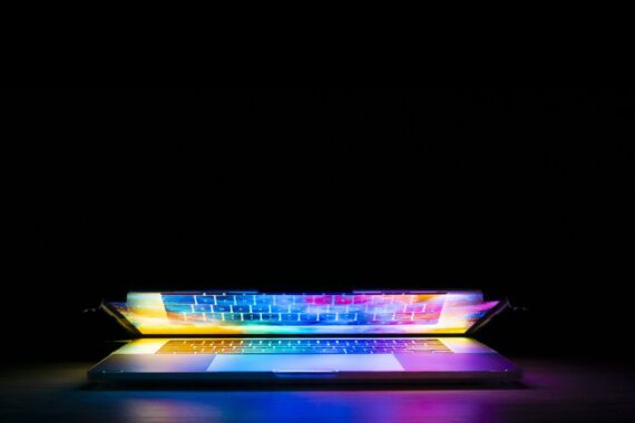 colorful laptop computer with dark background